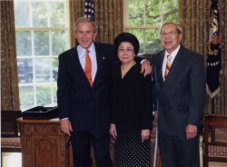 President George W. Bush, my mom Rosa Moy, and my dad Tom Moy.